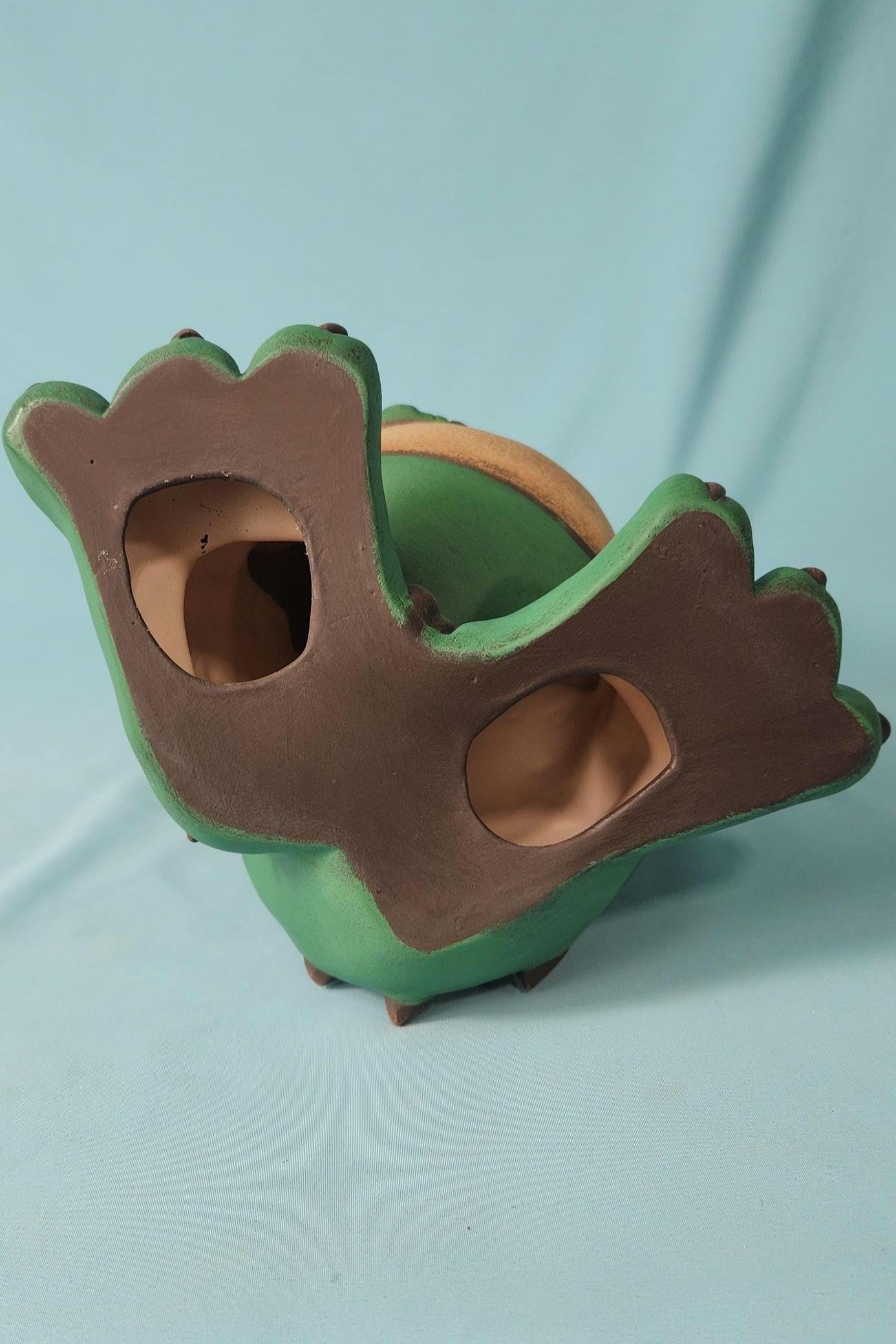 Silly Dragon holding a dragon fly - Teresa's Ceramics