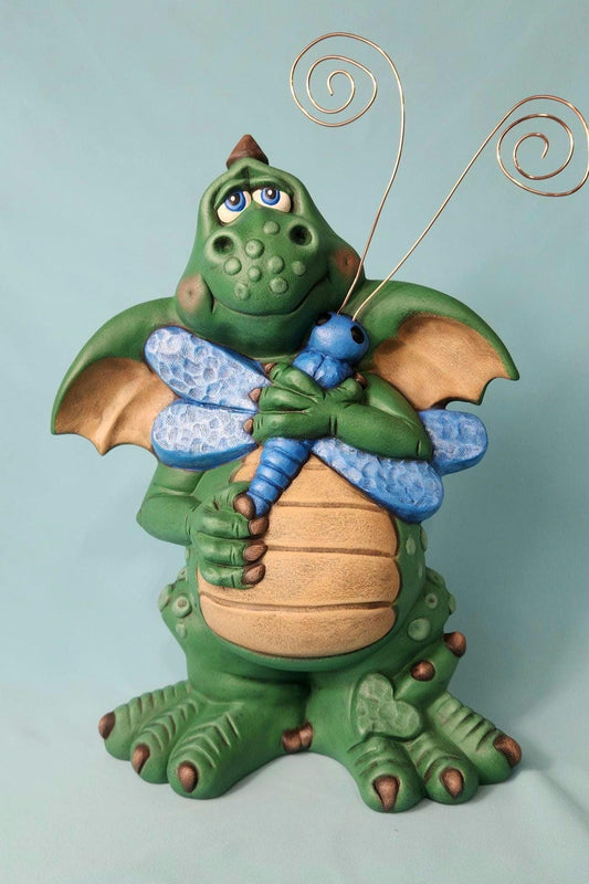 Silly Dragon holding a dragon fly - Teresa's Ceramics
